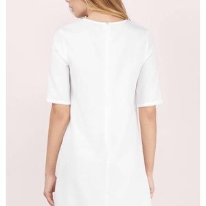 White Tobi shift dress featuring patch pockets